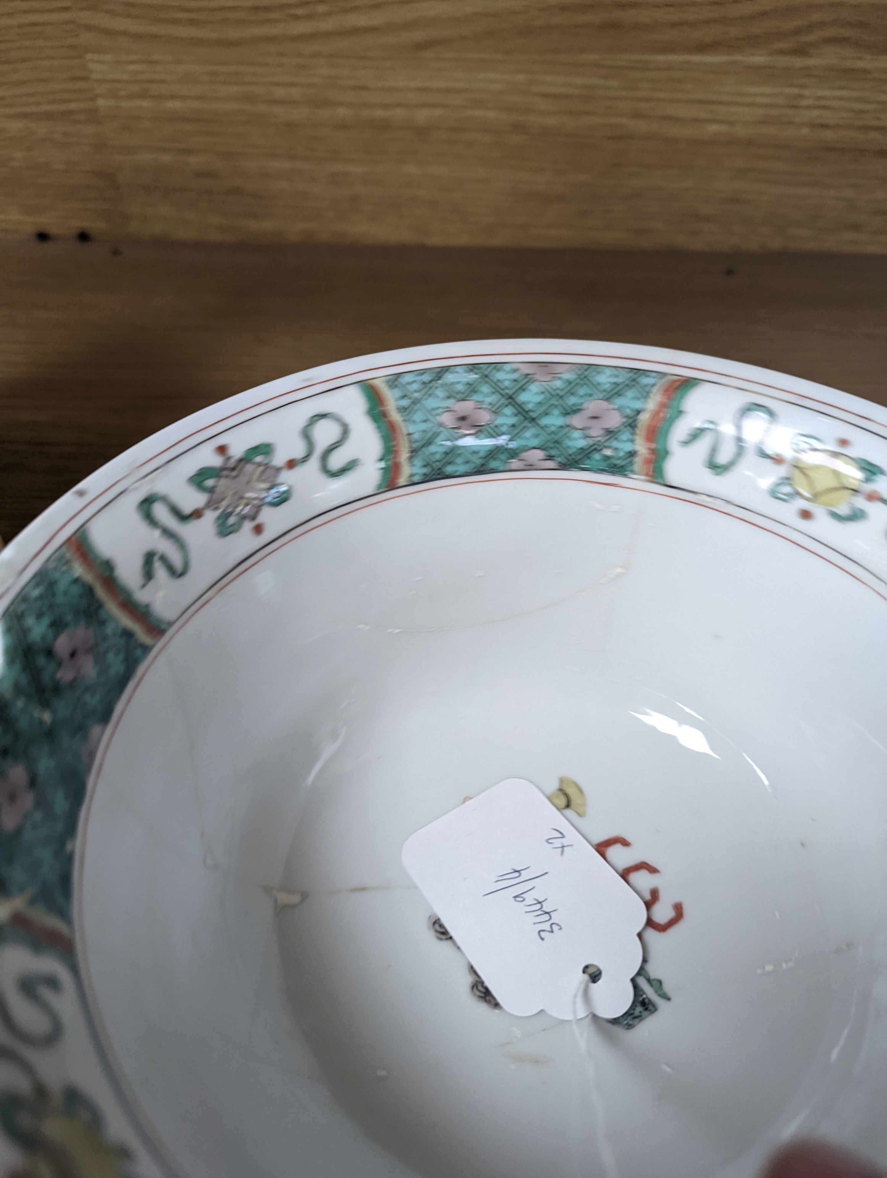 A Kangxi famille verte bowl, 20cm (a.f.) and a Chinese Dowager Empress-pattern pillow with dragons